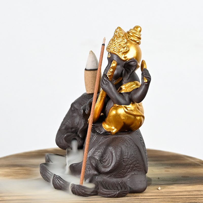 Keramik-Ganesha sitzt auf dem Elefanten-Wasserfall Backflow-Räucherstäbchen-Kegel-Keramik-Backflow-Räucherbrenner